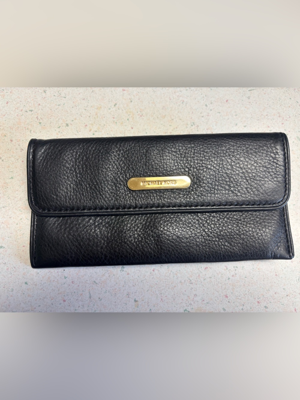 Michael Kors Black Pebbled Leather Continental Wallet with Gold Plaque